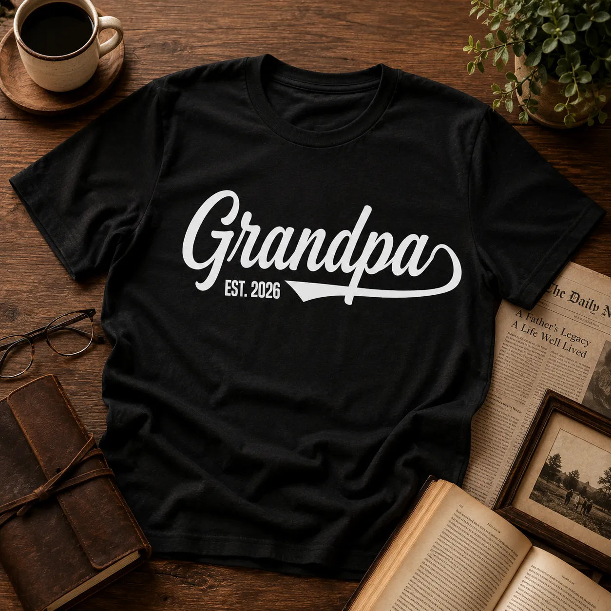 Personalized grandpa est. year t-shirt flatlay with script typography design and warm modern grandfather lifestyle styling