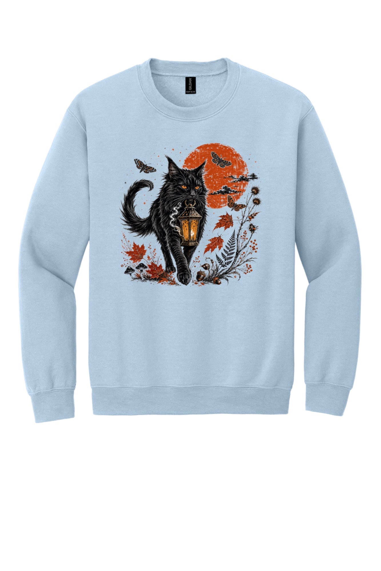 Black cat carrying glowing lantern Halloween crewneck sweatshirt with harvest moon moths and autumn botanicals, DTF print in Light Blue