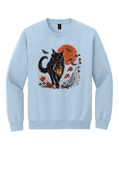 Black cat carrying glowing lantern Halloween crewneck sweatshirt with harvest moon moths and autumn botanicals, DTF print in Light Blue