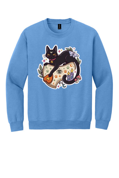 Black cat witch familiar ouija planchette Halloween crewneck sweatshirt with candles moth and moon in Carolina Blue