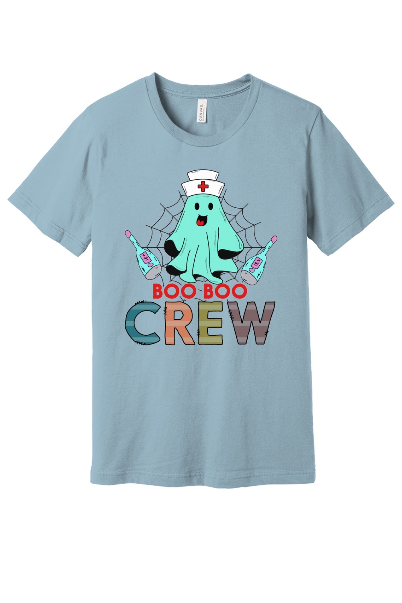 Boo Boo Crew Halloween nurse ghost graphic tee printed on BELLA+CANVAS 3001 unisex short sleeve shirt in Light Blue