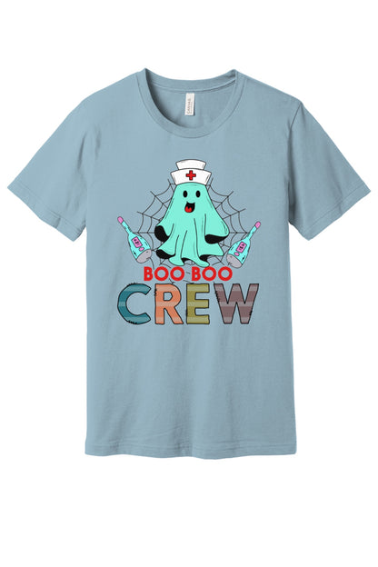 Boo Boo Crew Halloween nurse ghost graphic tee printed on BELLA+CANVAS 3001 unisex short sleeve shirt in Light Blue