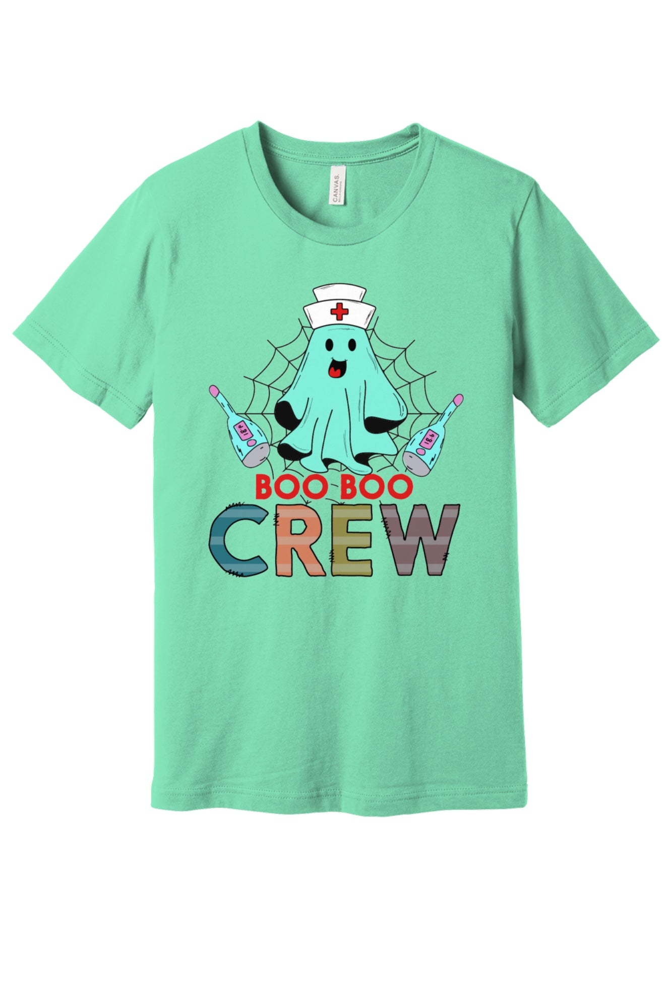 Boo Boo Crew Halloween nurse ghost graphic tee printed on BELLA+CANVAS 3001 unisex short sleeve shirt in Mint
