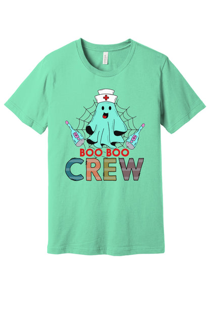 Boo Boo Crew Halloween nurse ghost graphic tee printed on BELLA+CANVAS 3001 unisex short sleeve shirt in Mint