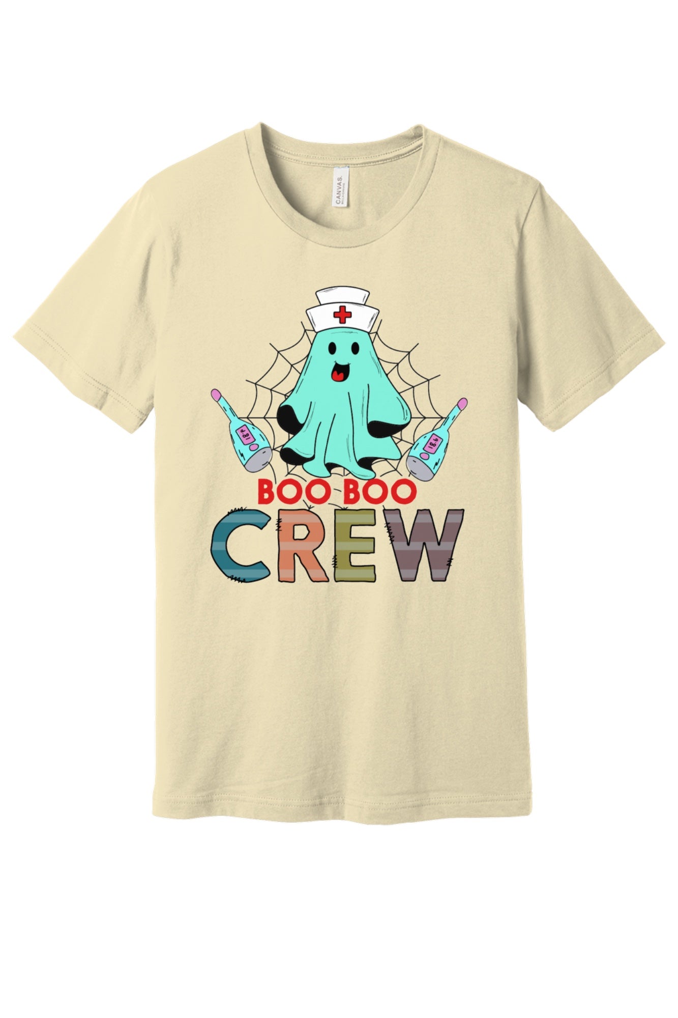 Boo Boo Crew Halloween nurse ghost graphic tee printed on BELLA+CANVAS 3001 unisex short sleeve shirt in Natural