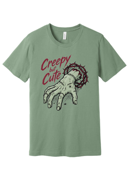 Creepy but Cute zombie hand thorn crown spiderweb Halloween graphic tee on white shirt in Sage