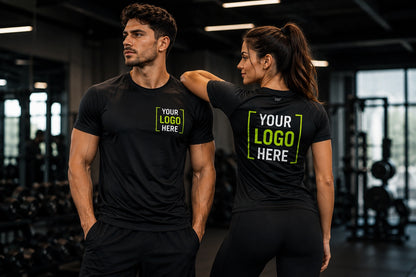 Male and female fitness models wearing custom moisture wicking gym shirts with front and back YOUR LOGO HERE prints in a modern gym environment