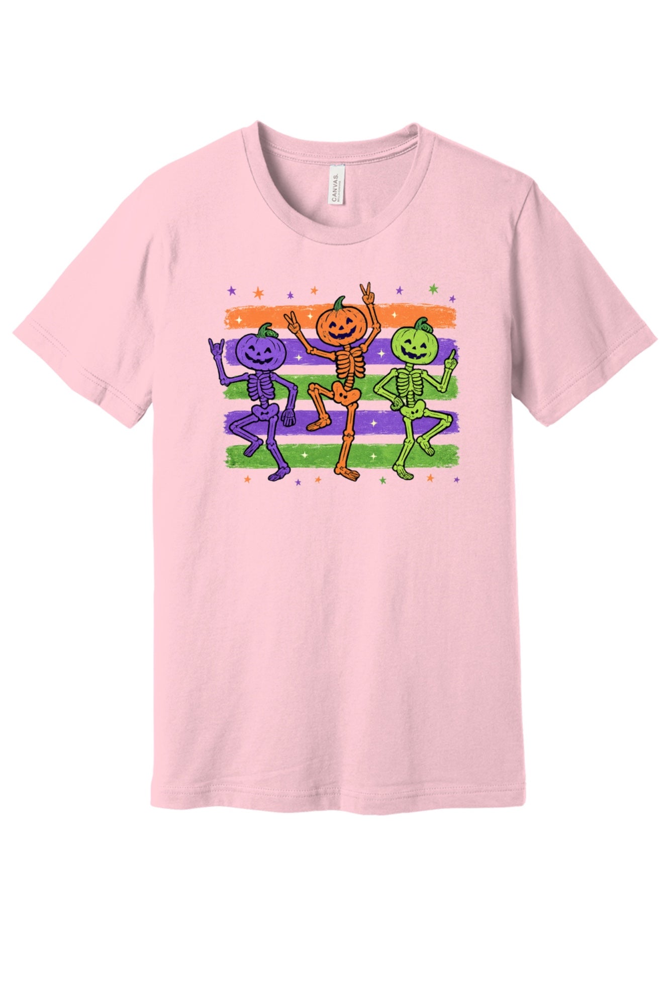 Dancing pumpkin head skeletons Halloween unisex tee in purple orange and green on striped background in Pink