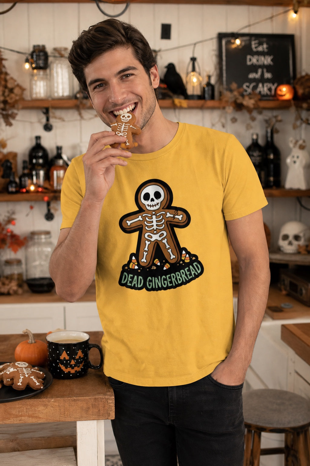 Dead Gingerbread skeleton cookie Halloween graphic tee with candy corn base, unisex short sleeve shirt worn by a model