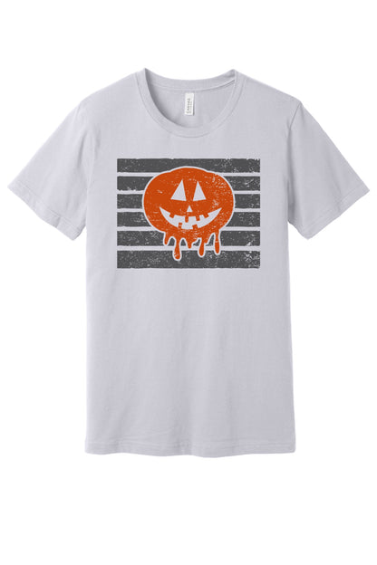 Dripping jack-o-lantern Halloween graphic tee with melting pumpkin face on black stripe print in Lavender Dust
