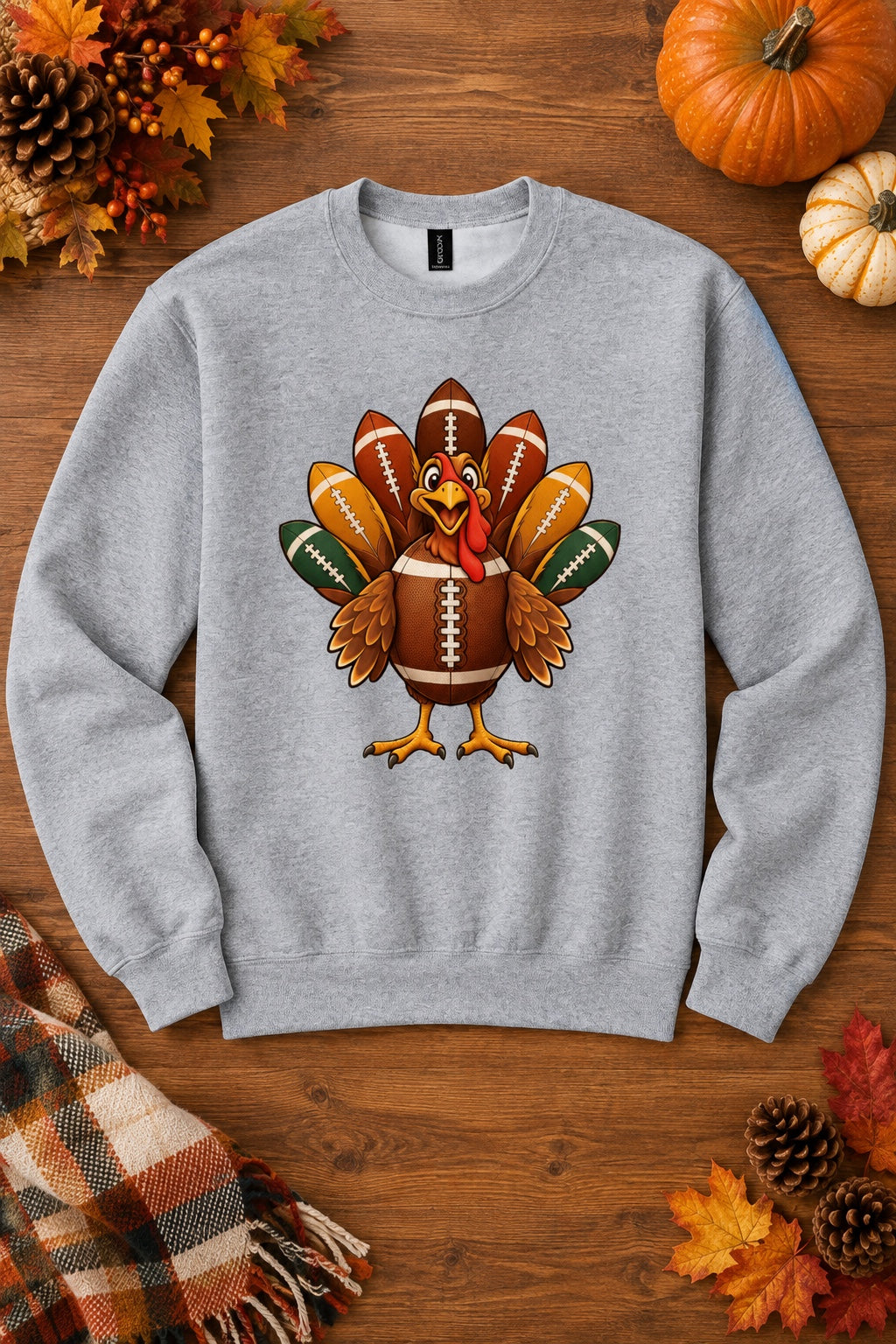 Football turkey cartoon crewneck sweatshirt DTF printed Thanksgiving design on Gildan 18000, styled flat lay, no model