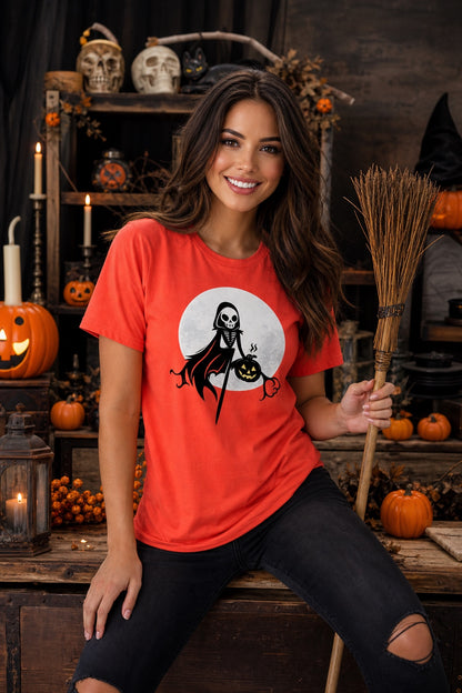 Grim reaper skeleton holding jack-o-lantern Halloween graphic tee with moon background, printed unisex shirt worn by a model