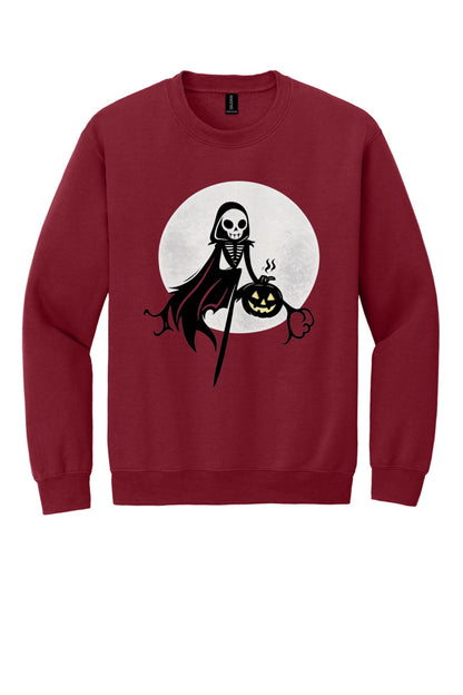 Grim reaper skeleton holding jack-o-lantern Halloween print on a crewneck sweatshirt in Cardinal Red