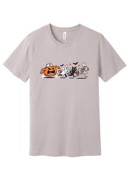 Halloween nurse tee with running jack-o-lantern ghost skeleton black cat cartoon print on unisex jersey shirt in Pink Gravel