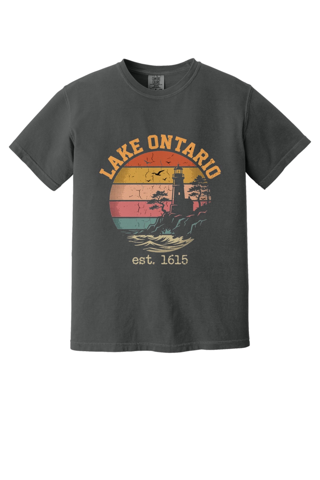Lake Ontario est. 1615 retro lighthouse sunset graphic printed on a Comfort Colors heavyweight tee in Graphite