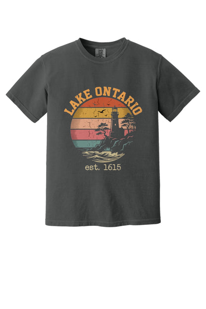 Lake Ontario est. 1615 retro lighthouse sunset graphic printed on a Comfort Colors heavyweight tee in Graphite