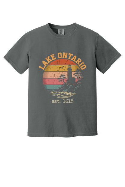 Lake Ontario est. 1615 retro lighthouse sunset graphic printed on a Comfort Colors heavyweight tee in Pepper