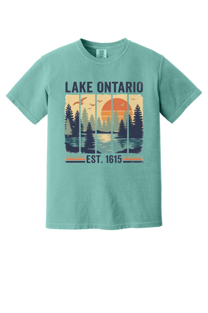 Lake Ontario Est. 1615 vintage pine forest sunset printed on a Comfort Colors heavyweight tee in Seafoam