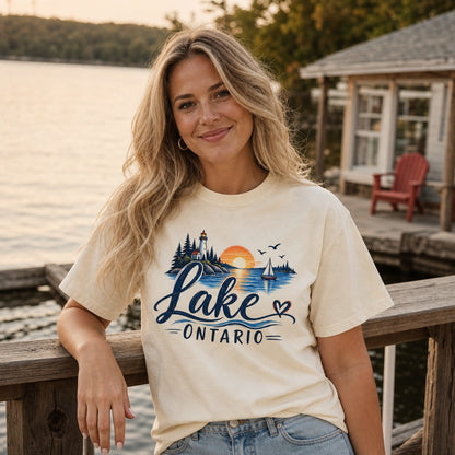 Lake Ontario lighthouse sunset sailboat graphic tee, Lake America protest shirt, DTF printed on Comfort Colors 1717, worn by a model