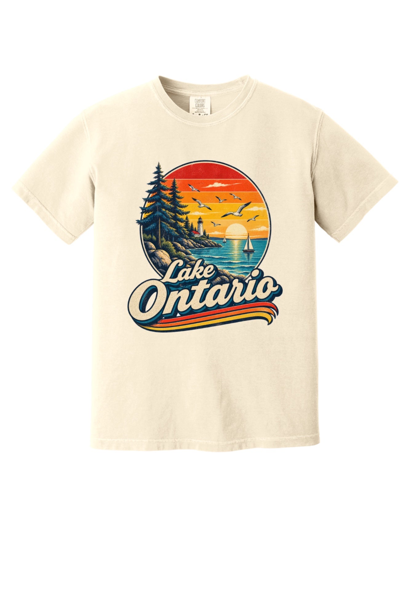 Lake Ontario vintage sunset lighthouse graphic tee with sailboats and seagulls, bold retro script design in Ivory