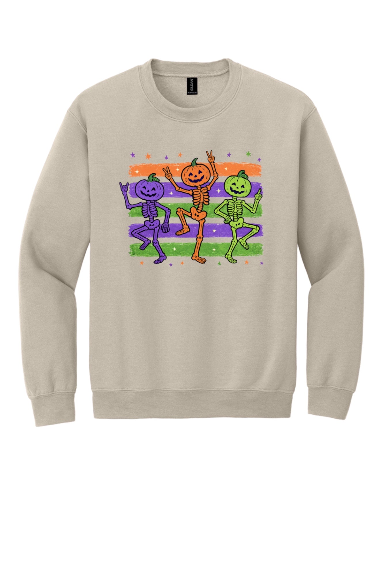 Dancing pumpkin head skeleton trio Halloween crewneck sweatshirt in purple orange and green on white in Sand