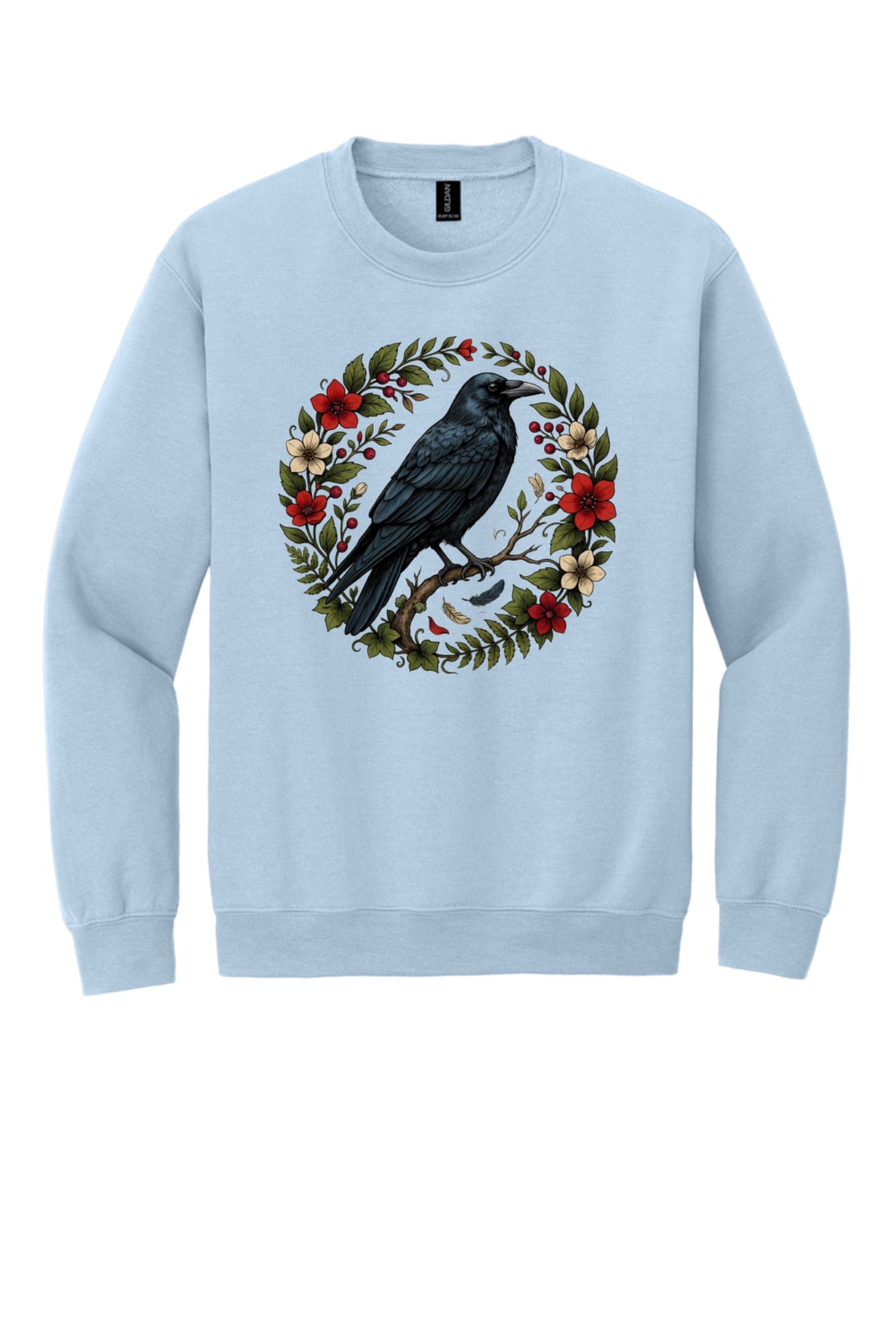 Raven perched on branch inside red floral botanical wreath, printed on a Halloween crewneck sweatshirt in Light Blue