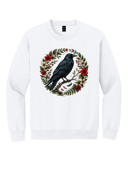 Raven perched on branch inside red floral botanical wreath, printed on a Halloween crewneck sweatshirt in White