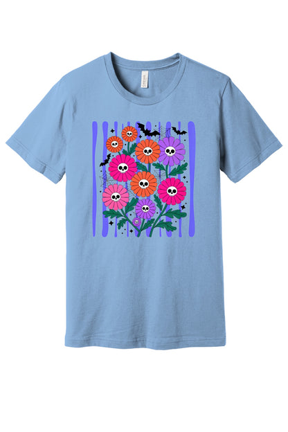 Skull gerbera daisy bouquet with bats and spider webs Halloween graphic tee in orange pink and purple in Baby Blue