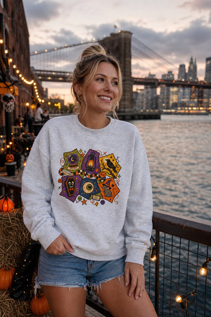 Spooky Halloween patchwork crewneck sweatshirt with STAY CREEPY, BOO, crystal ball, raven, witch mouse DTF print, worn by a model