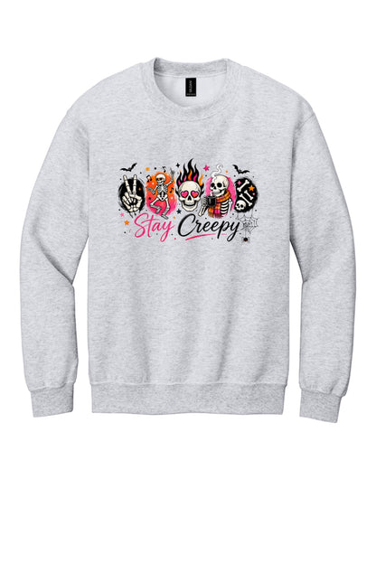 Stay Creepy skeleton Halloween crewneck sweatshirt with flaming skull and heart-eyes DTF print, Gildan 18000 in Ash