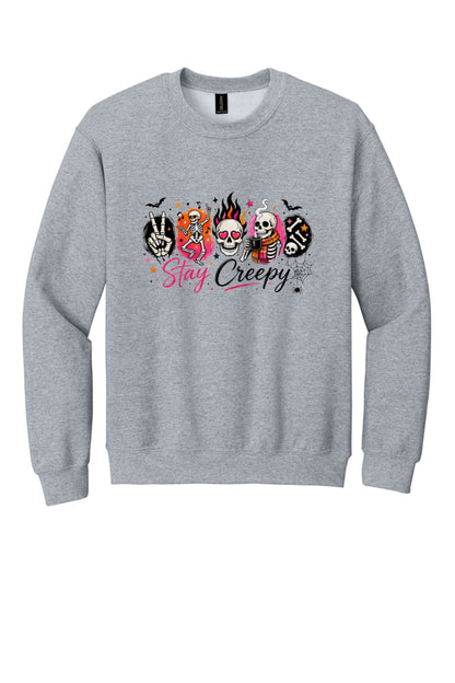 Stay Creepy skeleton Halloween crewneck sweatshirt with flaming skull and heart-eyes DTF print, Gildan 18000 in Sport Grey
