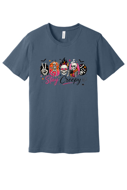 Stay Creepy Halloween graphic tee with dancing skeletons flaming skull and rock hand print in Slate
