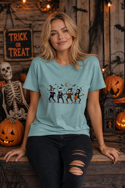 Stay Spooky skeleton punk rock band Halloween printed unisex tee with orange moon and bats worn by a model