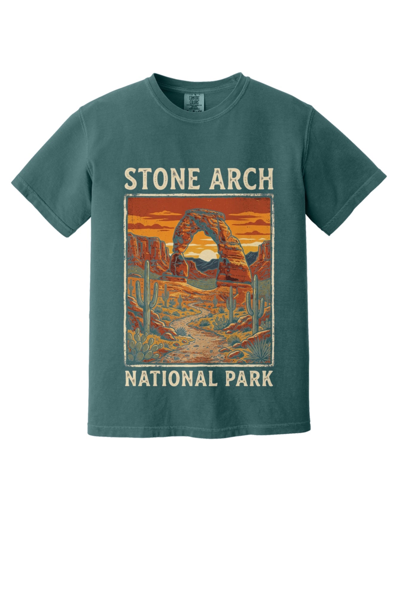 Stone Arch National Park printed tee, retro red rock arch and cactus sunset design on garment-dyed cotton shirt in Blue Spruce