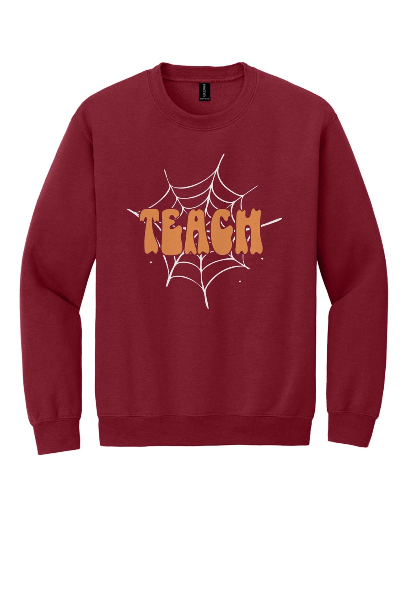Teach groovy retro bubble letter Halloween crewneck sweatshirt, warm orange DTF print on dark fabric in Cardinal Red