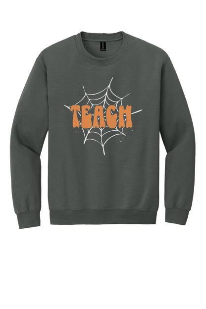 Teach groovy retro bubble letter Halloween crewneck sweatshirt, warm orange DTF print on dark fabric in Charcoal