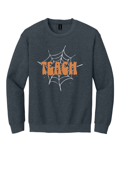 Teach groovy retro bubble letter Halloween crewneck sweatshirt, warm orange DTF print on dark fabric in Dark Heather