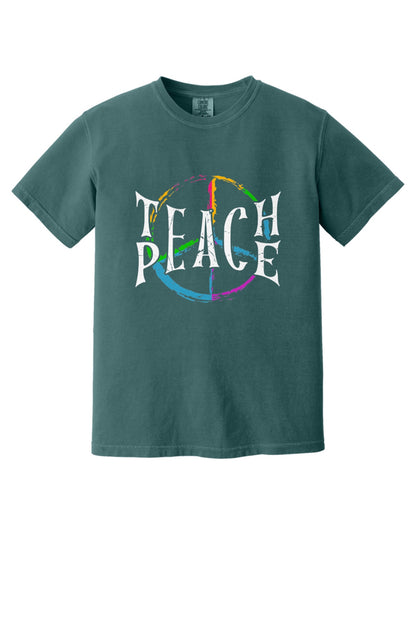 Teach Peace multi-color brushstroke peace sign printed on a Comfort Colors heavyweight tee in Blue Spruce