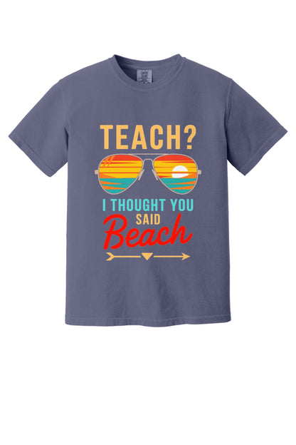 Teach I Thought You Said Beach printed teacher tee with retro aviator sunglasses sunset graphic in Grape