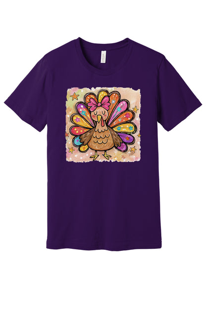 Colorful thanksgiving girl turkey pink bow watercolor tee printed on BELLA+CANVAS unisex short sleeve shirt in Team Purple