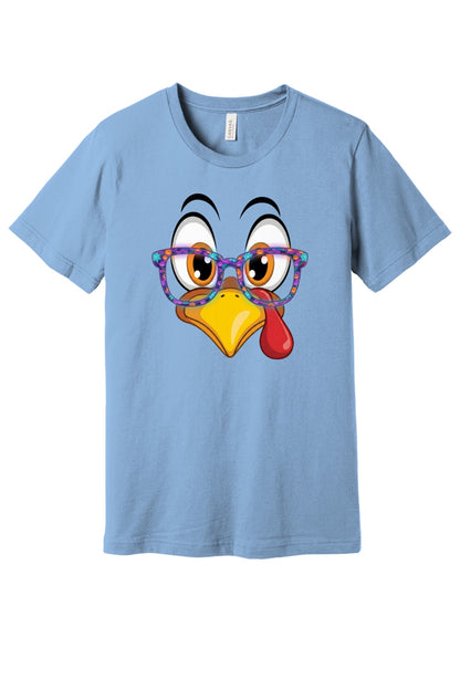 Funny turkey face with Halloween glasses Thanksgiving unisex tee printed with cartoon gobbler design in Baby Blue