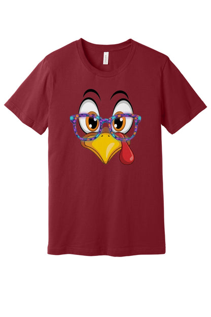 Funny turkey face with Halloween glasses Thanksgiving unisex tee printed with cartoon gobbler design in Cardinal