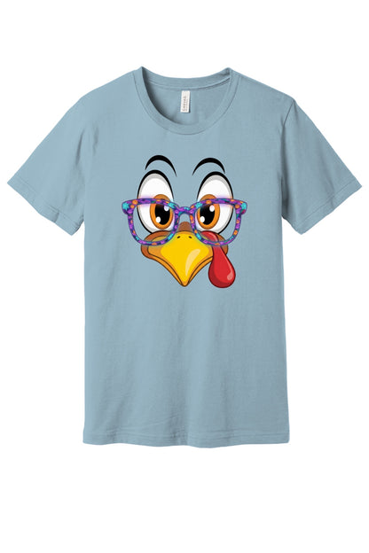 Funny turkey face with Halloween glasses Thanksgiving unisex tee printed with cartoon gobbler design in Light Blue