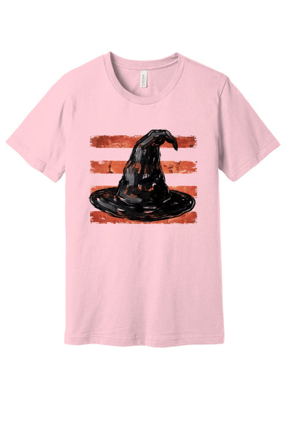 Black brushstroke witch hat on burnt-orange stripe Halloween graphic tee, DTF print, unisex cotton in Pink