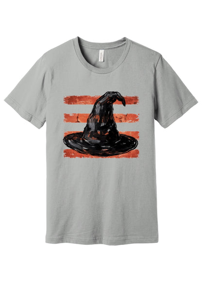 Black brushstroke witch hat on burnt-orange stripe Halloween graphic tee, DTF print, unisex cotton in Silver