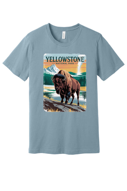 Yellowstone National Park vintage bison poster graphic tee printed on a BELLA+CANVAS 3001 unisex short sleeve shirt in Denim