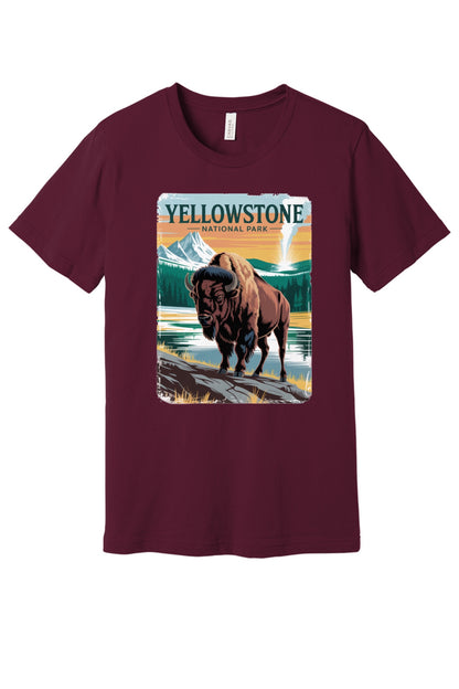 Yellowstone National Park vintage bison poster graphic tee printed on a BELLA+CANVAS 3001 unisex short sleeve shirt in Maroon