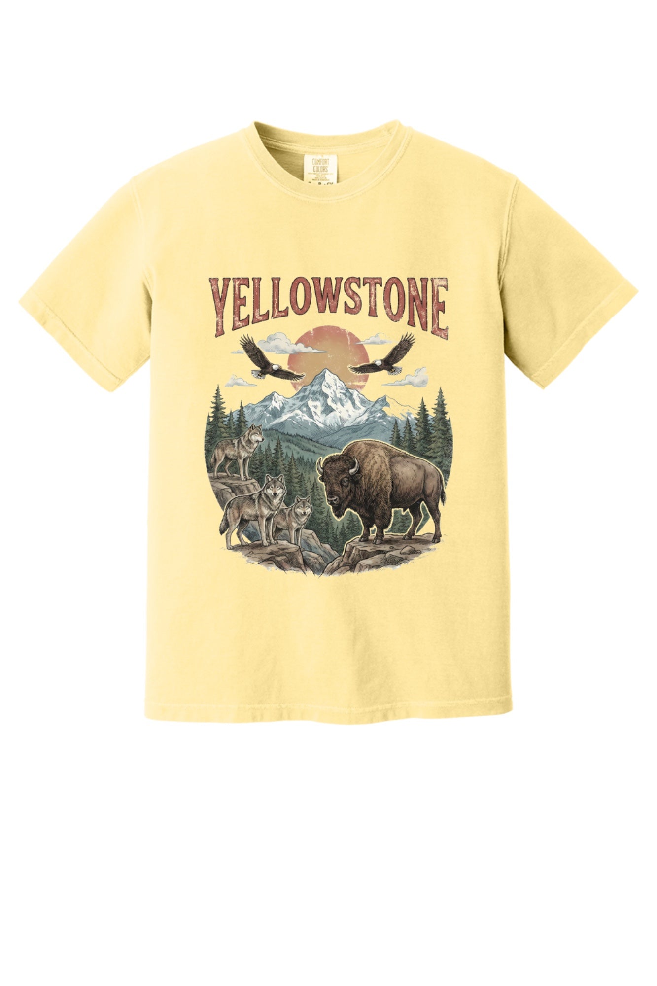 Yellowstone national park tee with wolves, bison, eagles, and mountain print on a heavyweight garment-dyed shirt in Butter