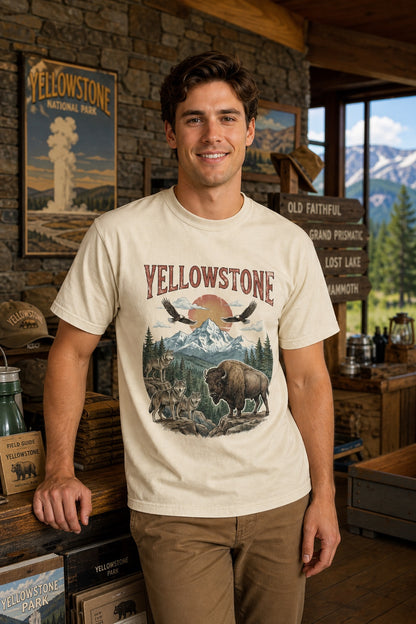 Yellowstone national park tee with wolves, bison, eagles, and mountain print on a heavyweight garment-dyed shirt worn by a model